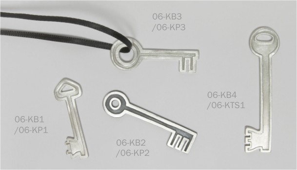 Key brooches, pendants and tie slide